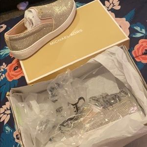 Michael Kors slip on shoes.